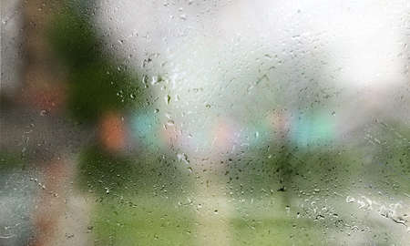Background with rain drops close up. Rain drops on outdoor window, Closeup view transparent water...