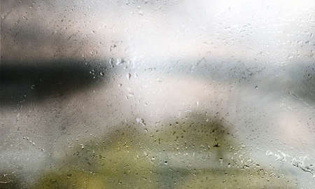 Rain drops on the window, condensation on the glass, rainy weather