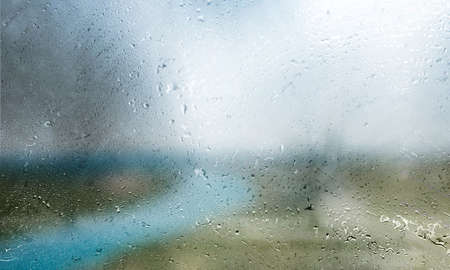 Background with rain drops close up. Rain drops on outdoor window, Closeup view transparent water...