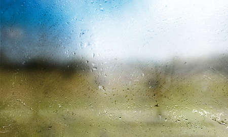 Water drops on the window. Rainy weather. Natural background.