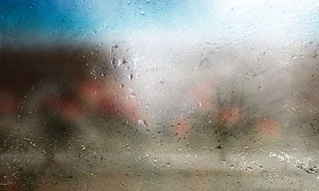 Background with rain drops close up. Rain drops on outdoor window, Closeup view transparent water...