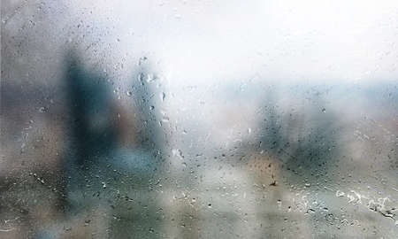 Background with rain drops close up. Rain drops on outdoor window, Closeup view transparent water...