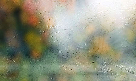 Background with rain drops close up. Rain drops on outdoor window, Closeup view transparent water...