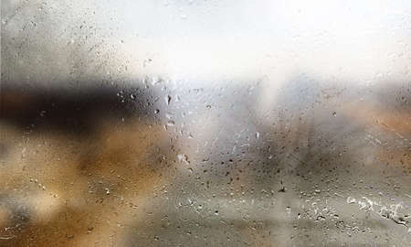 Rain drops on the window, close-up. Rainy weather.