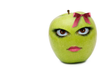 An apple appears to have the face of a woman. の写真素材