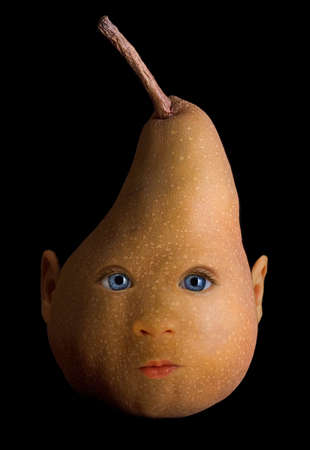A pear appears to have the face of a human baby. の写真素材