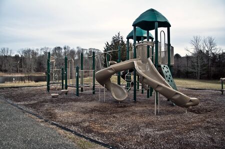 An empty playground on a lakeのeditorial素材