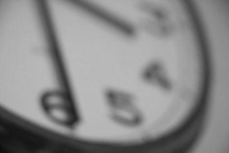 Blurred image of analog wall clock backgroundの写真素材