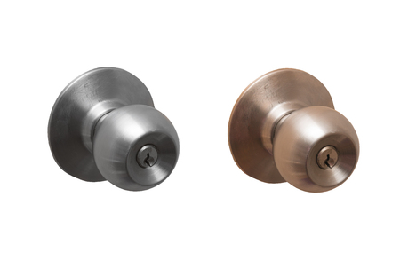 Basic modern door knob with gold and silver color isolated on white, interior design conceptの写真素材
