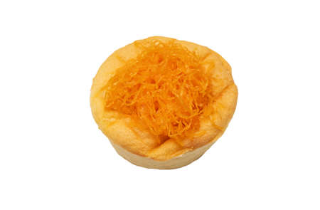 Sponge cake topping with golden thread for one serving. isolated on white. Dessert recipe concept.の写真素材