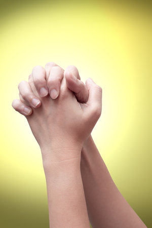 Praying hand sign, two woman's palm are clasped all together, isolated on white. hand language conceptの写真素材