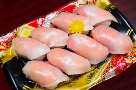 Closed up of tuna sushi set on plastic plate. Take home set. Japanese traditional foodの写真素材