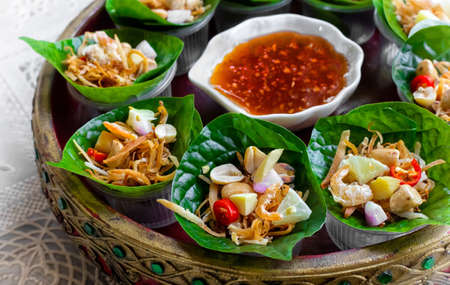 Betel Leaf Wrap or Miang kham before wrapping . Snack food that originated in the northern part of Thailandの写真素材
