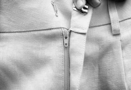 Street style fashion linen shorts close-up, classic summer style outfit, Black and white toneの写真素材