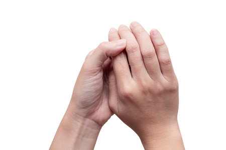 Woman hands holding isolated on white background. Healthcare problem. Pain and infection.の写真素材