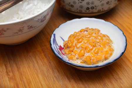 Close up of Natto or Fermented Soybean with another food on dining table. Traditional food in Japan. Ready to eatの写真素材