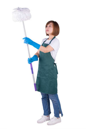 Young Asian housewife cleaning ceiling with mopの写真素材