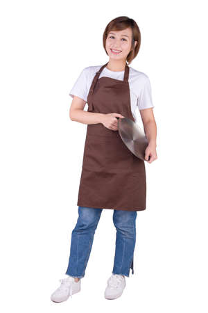Waitress in apron holding a silver plate. Isolated on white background.の写真素材