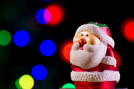Cute Santa Claus on shiny lighting backgroundの写真素材