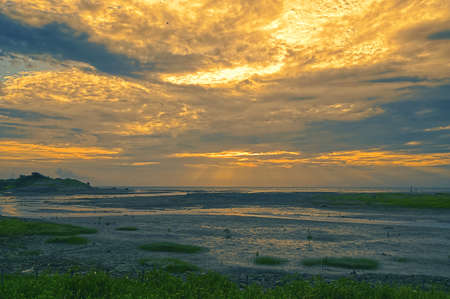 Sunset of the warm wetlands in nature.の写真素材