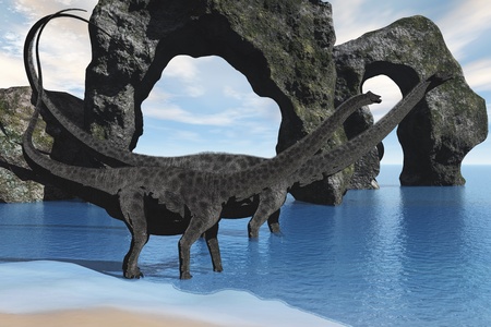 DIPLODOCUS WADING - Two Diplodocus dinosaurs wade through shallow waters of a beautiful seashore.の写真素材