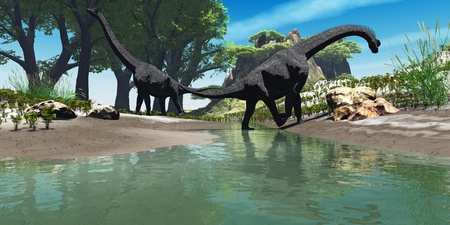Brachiosaurus Dinosaurus - Two titanic Brachiosaurus dinosaurs look for food along the banks of a stream.の写真素材