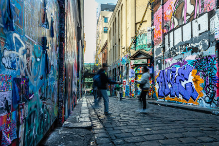 MELBOURNE, AUSTRALIA - APRIL 12, 2024: Tourists roaming in Hosier Lane