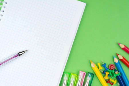 A notebook is on the green table. We are ready to record important thoughtsの写真素材