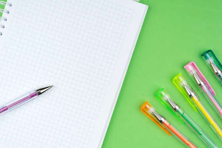 A notebook is on the green table. We are ready to record important thoughtsの写真素材