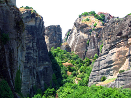 Panoramic view of the Holy Trinity Monastery of Meteora in Greece high in the mountains. Unusual architecture.の写真素材