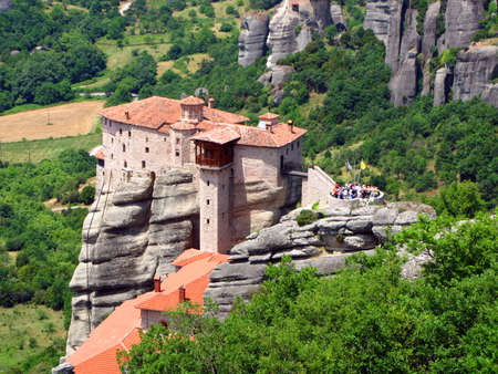 Panoramic view of the Holy Trinity Monastery of Meteora in Greece high in the mountains. Unusual architecture.の写真素材