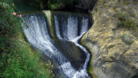 Beautiful unique landscape, mountain river, bay waterfall among the rocks, natural pools, SPA, Ontinyent, Spainの写真素材