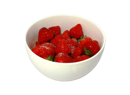 fresh juicy strawberry with sugar in the bowl isolatedの写真素材