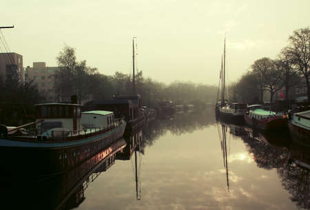 early morning on the river in Groningen, Netherlandsの写真素材