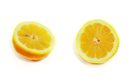 fresh juicy cut lemon isolated on white backgroundの写真素材