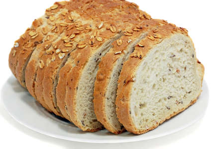 cut bread on the plate isolated on white background