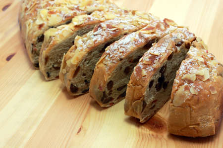 sweet sliced bread with raisins and almondsの写真素材