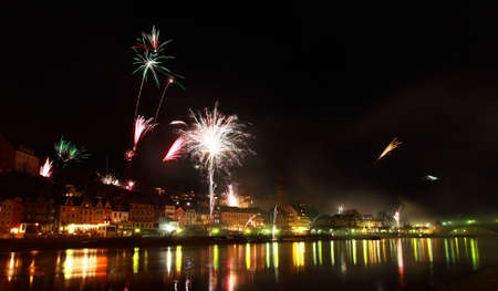multicolor fireworks in small German town Cochem close to riverのeditorial素材