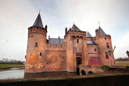 Dutch castle in the middle of the laken in Muidenのeditorial素材