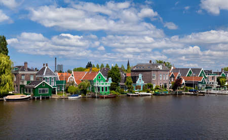 old green traditional houses in town Zaanse Schans in Netherlandsの写真素材