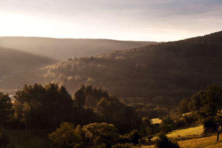 Bavarian mountains in sunbeams at early sunriseの写真素材