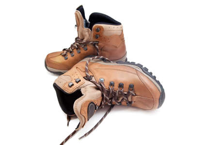 pair female mountain hiking shoes over whiteの写真素材