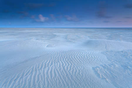 sand dunes on North sea coast at sunrise, Schiermonnikoog, Netherlands