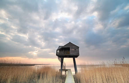 wooden observation tower on Dollard coast, Groningen, Netherlandsの写真素材