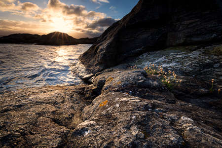 beautiful sunrise on sea coast in Swedenの写真素材