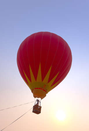 Red balloons in the skyの写真素材