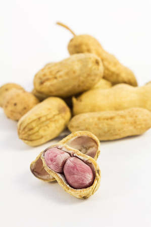 Peanuts on white ground