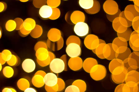 Gold Bokeh on a dark の写真素材