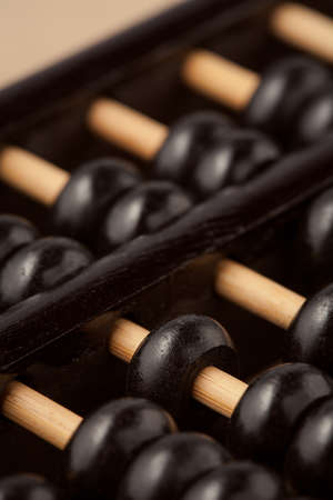 Abacus on a wooden floorの写真素材