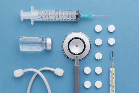 Flat lay top view equipment medical on blue backgroundの写真素材